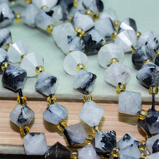 The Sparkle of Symmetry: Bicone-Shaped Gemstone Beads