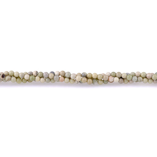 This is a Dakota Stones 4mm Australian Butter Jasper Gemstone strand with round beads in 15-16 inch strand.