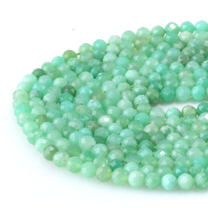 This is a Dakota Stones 4mm Australian Chrysoprase Gemstone strand with AAA grade faceted round beads in 15-16 inch strand.