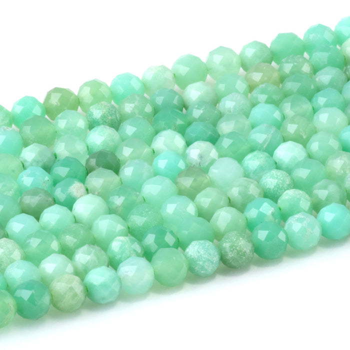 This is a Dakota Stones 4mm Australian Chrysoprase Gemstone strand with AAA grade faceted round beads in 15-16 inch strand.
