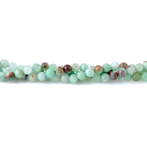 This is a Dakota Stones 6mm Australian Chrysoprase Gemstone strand with round beads in 15-16 inch strand.