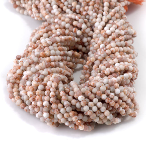 This is a Dakota Stones 3mm Special Price Ancient Cellar Red Agate Gemstone strand with faceted round beads in 15 inch strand.