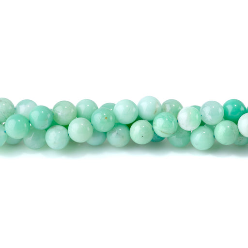 This is a Dakota Stones 10mm Australian Chrysoprase Gemstone strand with AA grade round beads in 15-16 inch strand.