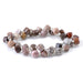 This is a Dakota Stones 6x8mm African Petrified Wood Agate Corner Gemstone strand with table-cut cube beads in 15-16 inch strand.