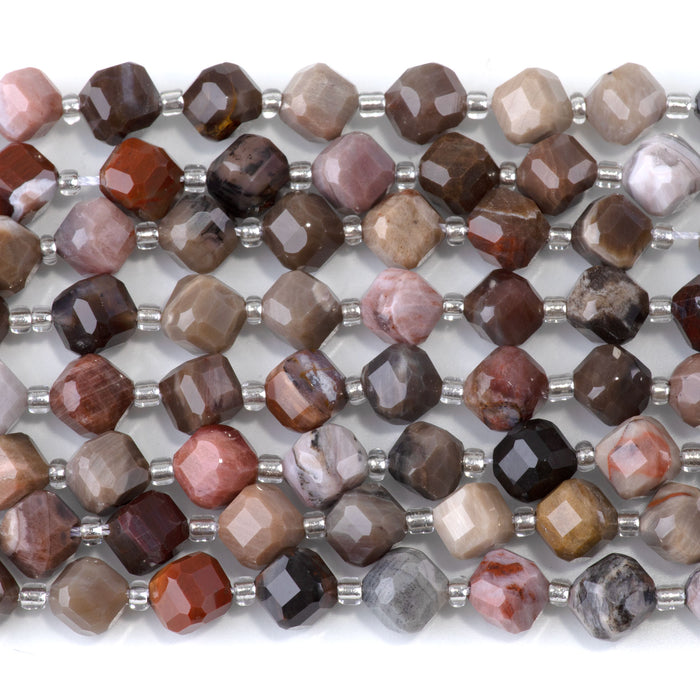 This is a Dakota Stones 6x8mm African Petrified Wood Agate Corner Gemstone strand with table-cut cube beads in 15-16 inch strand.