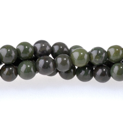 This is a Dakota Stones 4mm African Green Jasper Gemstone strand with round beads in 15-16 inch strand.