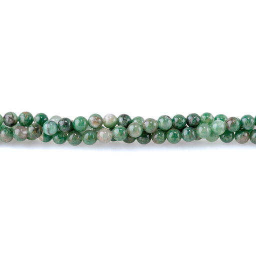 This is a Dakota Stones 6mm African Jade Quartz Gemstone strand with round beads in 15-16 inch strand.