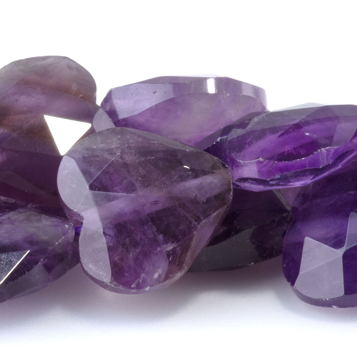 This is a Dakota Stones 14mm Amethyst Gemstone strand with A grade faceted heart beads in 15-16 inch strand.