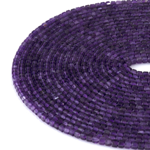 This is a Dakota Stones 3mm Amethyst Table Cut Gemstone strand with A grade cube beads in 15-16 inch strand.
