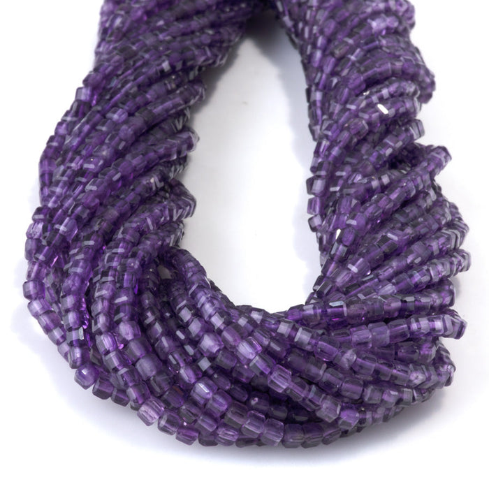 This is a Dakota Stones 3mm Amethyst Table Cut Gemstone strand with A grade cube beads in 15-16 inch strand.
