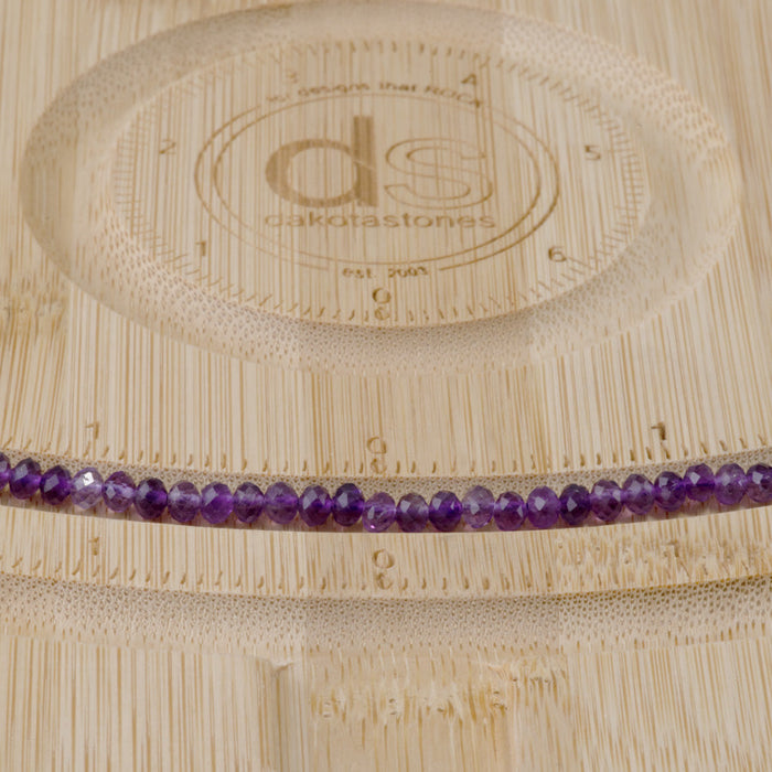 This is a Dakota Stones 3x4mm Amethyst Gemstone strand with A grade faceted rondelle beads in 15-16 inch strand.