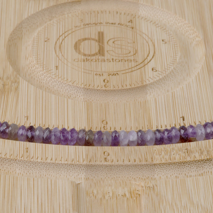 This is a Dakota Stones 3x6mm Amethyst Gemstone strand with A grade faceted rondelle beads in 15-16 inch strand.