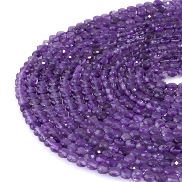 This is a Dakota Stones 4mm Amethyst Gemstone strand with A grade faceted coin beads in 15-16 inch strand.