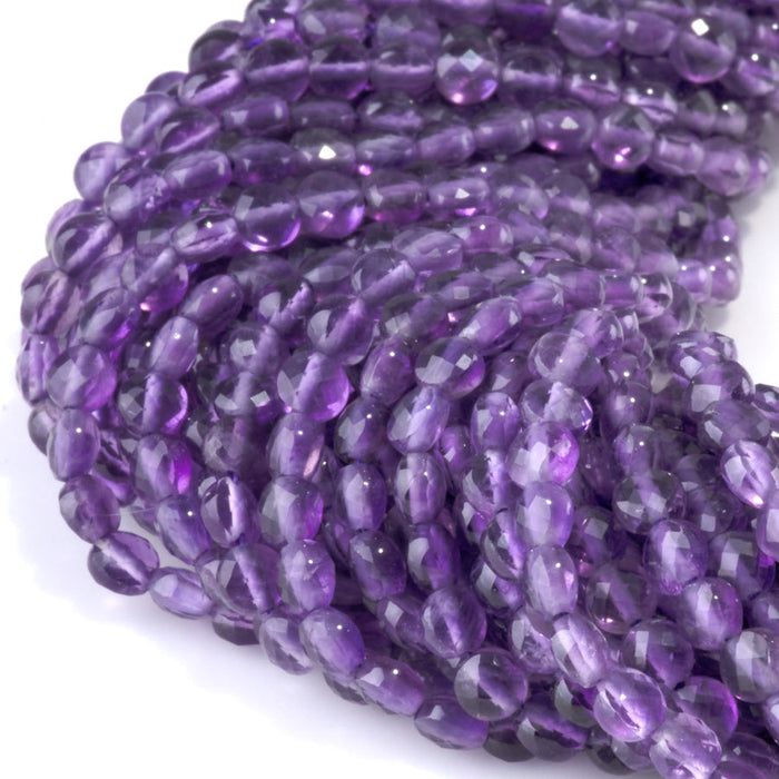 This is a Dakota Stones 4mm Amethyst Gemstone strand with A grade faceted coin beads in 15-16 inch strand.
