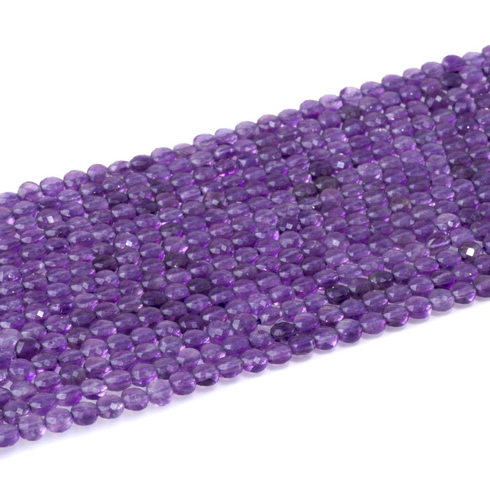 This is a Dakota Stones 4mm Amethyst Gemstone strand with A grade faceted coin beads in 15-16 inch strand.