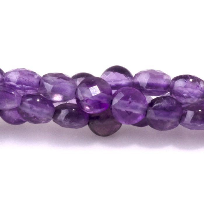 This is a Dakota Stones 4mm Amethyst Gemstone strand with A grade faceted coin beads in 15-16 inch strand.