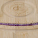 This is a Dakota Stones 4mm Amethyst Gemstone strand with A grade faceted coin beads in 15-16 inch strand.
