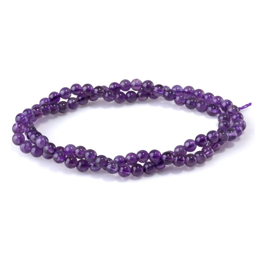 This is a Dakota Stones 4mm Amethyst Gemstone strand with A grade round beads in 15-16 inch strand.