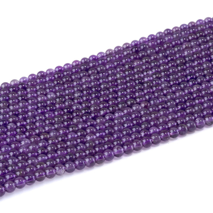 This is a Dakota Stones 4mm Amethyst Gemstone strand with A grade round beads in 15-16 inch strand.