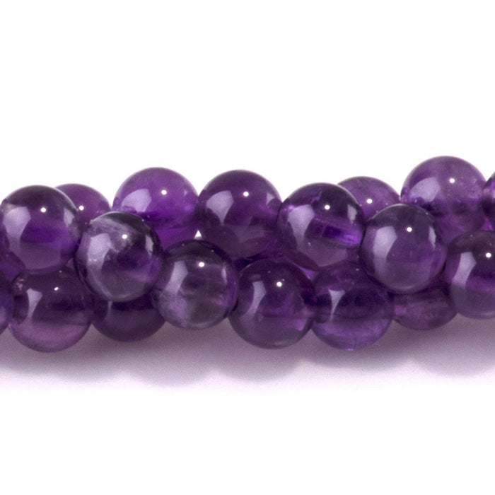 This is a Dakota Stones 4mm Amethyst Gemstone strand with A grade round beads in 15-16 inch strand.