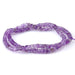 This is a Dakota Stones 4x6mm Amethyst Gemstone strand with irregular heishi beads in 15-16 inch strand.