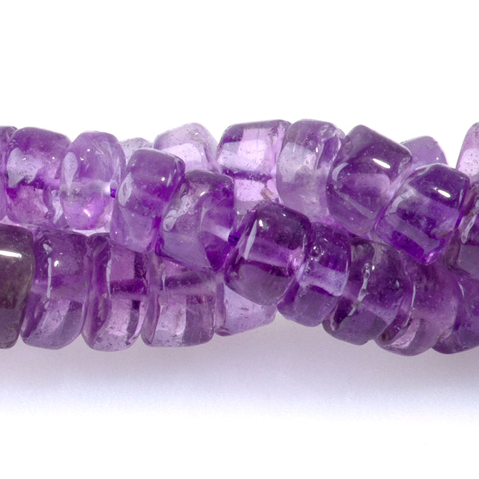 This is a Dakota Stones 4x6mm Amethyst Gemstone strand with irregular heishi beads in 15-16 inch strand.