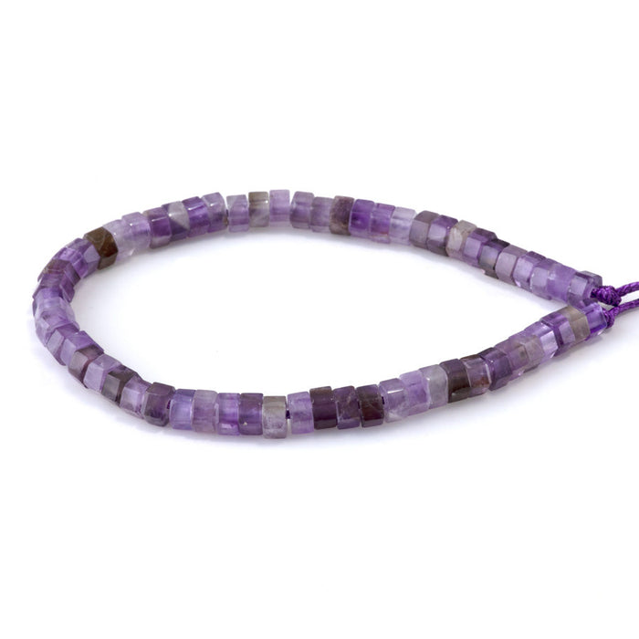 This is a Dakota Stones 6mm Amethyst Large Hole Gemstone strand with faceted hexagon beads in 8 inch strand.