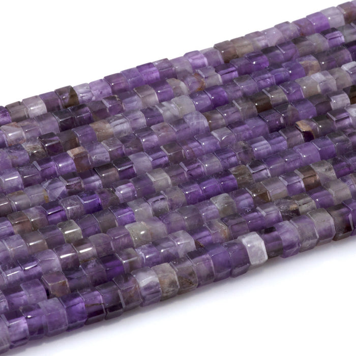 This is a Dakota Stones 6mm Amethyst Large Hole Gemstone strand with faceted hexagon beads in 8 inch strand.