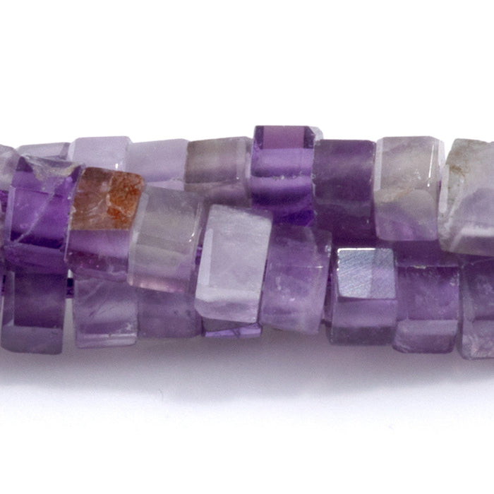 This is a Dakota Stones 6mm Amethyst Large Hole Gemstone strand with faceted hexagon beads in 8 inch strand.