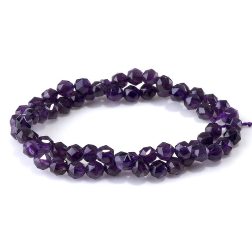 This is a Dakota Stones 6mm Amethyst Gemstone strand with A grade double heart faceted round beads in 15-16 inch strand.