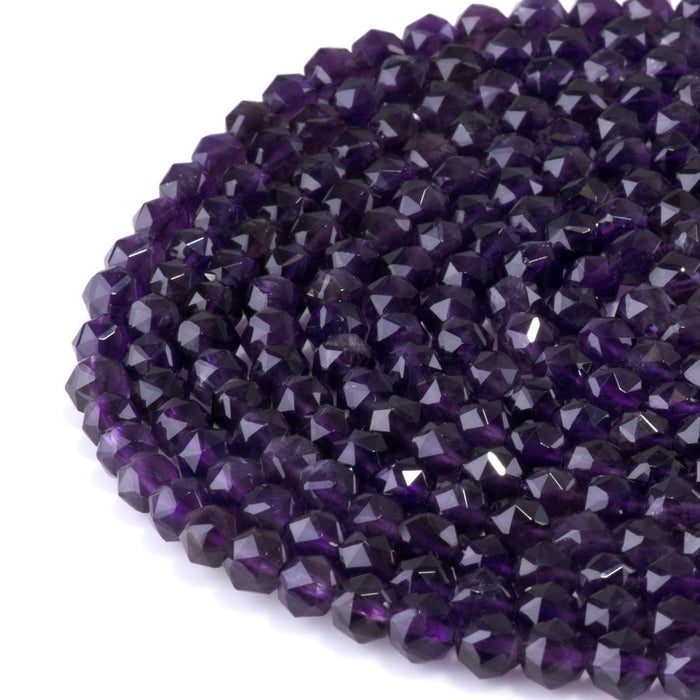 This is a Dakota Stones 6mm Amethyst Gemstone strand with A grade double heart faceted round beads in 15-16 inch strand.