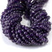 This is a Dakota Stones 6mm Amethyst Gemstone strand with A grade double heart faceted round beads in 15-16 inch strand.
