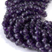 This is a Dakota Stones 6mm Amethyst Gemstone strand with A grade double heart faceted round beads in 15-16 inch strand.