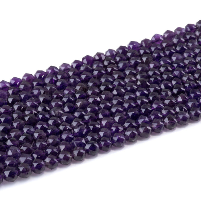 This is a Dakota Stones 6mm Amethyst Gemstone strand with A grade double heart faceted round beads in 15-16 inch strand.