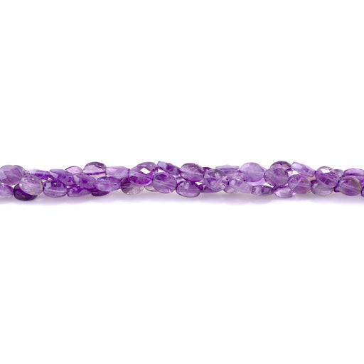 This is a Dakota Stones 6x8mm Amethyst Gemstone strand with faceted oval beads in 15-16 inch strand.