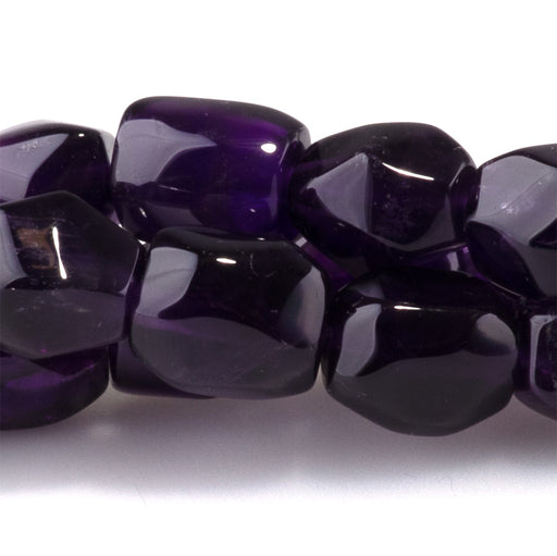 This is a Dakota Stones 7x10mm Amethyst Gemstone strand with nugget beads in 15-16 inch strand.