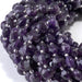 This is a Dakota Stones 8mm Amethyst Gemstone strand with A grade star cut faceted coin beads in 15-16 inch strand.
