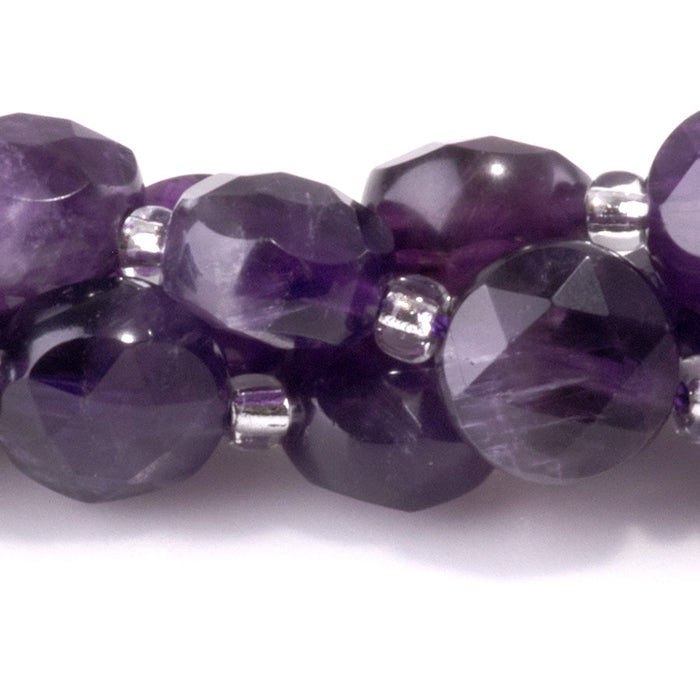 This is a Dakota Stones 8mm Amethyst Gemstone strand with A grade star cut faceted coin beads in 15-16 inch strand.