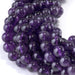 This is a Dakota Stones 8mm Amethyst Gemstone strand with A grade round beads in 15-16 inch strand.