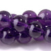 This is a Dakota Stones 8mm Amethyst Gemstone strand with A grade round beads in 15-16 inch strand.