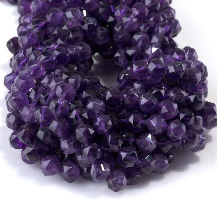 This is a Dakota Stones 8mm Amethyst Gemstone strand with A grade double heart faceted round beads in 15-16 inch strand.