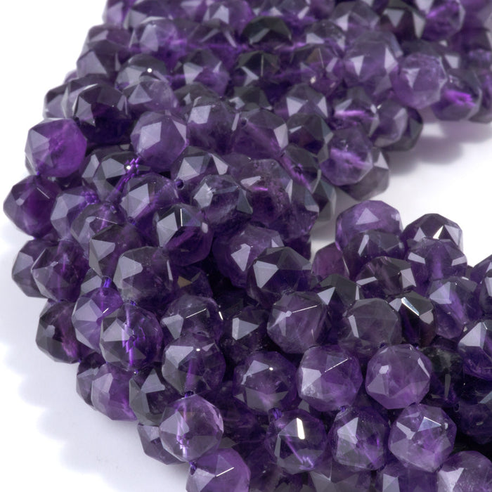 This is a Dakota Stones 8mm Amethyst Gemstone strand with A grade double heart faceted round beads in 15-16 inch strand.