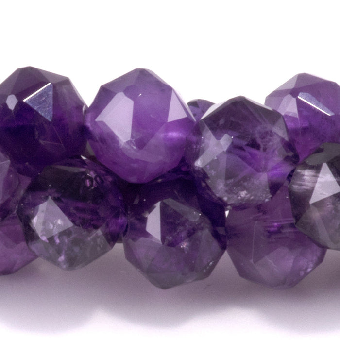 This is a Dakota Stones 8mm Amethyst Gemstone strand with A grade double heart faceted round beads in 15-16 inch strand.