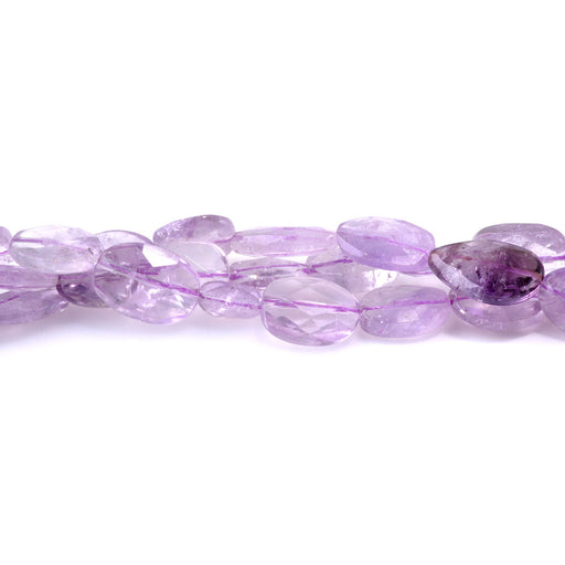 This is a Dakota Stones 9x11-13x18mm Light Amethyst Gemstone strand with A grade faceted free-form oval beads in 15-16 inch strand.