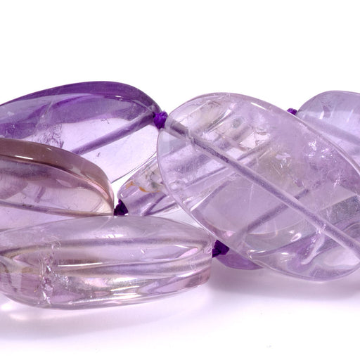 This is a Dakota Stones 18x28mm Ametrine Gemstone strand with oval beads in 15-16 inch strand.