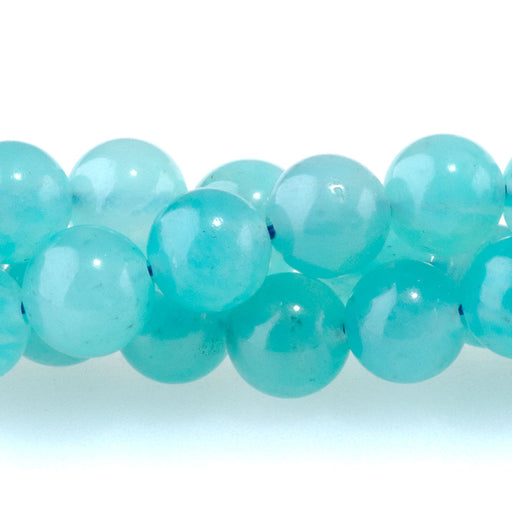 This is a Dakota Stones 6mm Ice Amazonite Gemstone strand with A grade round beads in 15-16 inch strand.