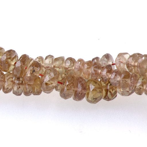 This is a Dakota Stones 3-4mm Andalusite Gemstone strand with faceted rondelle beads in 15-16 inch strand.