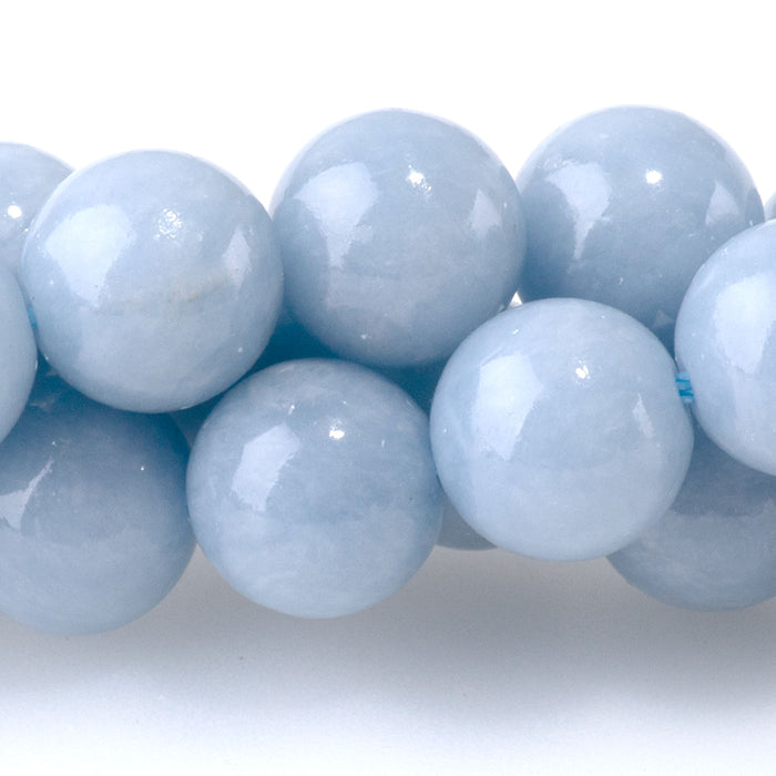 This is a Dakota Stones 8mm Angelite Gemstone strand with round beads in 15-16 inch strand.