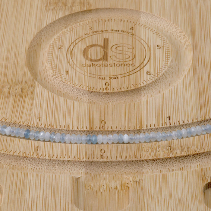 This is a Dakota Stones 2x4mm Aquamarine Gemstone strand with faceted rondelle beads in 15-16 inch strand.