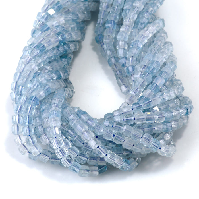 This is a Dakota Stones 3mm Aquamarine Gemstone strand with AAA grade table-cut cube beads in 15-16 inch strand.